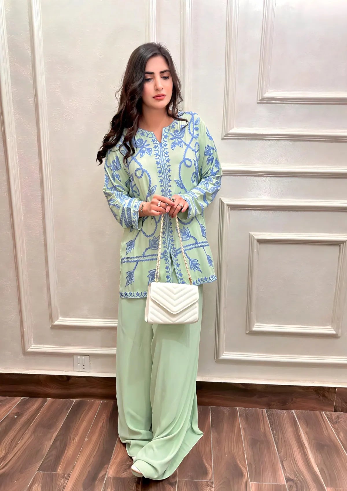 mohsin-saeed-fabrics-designer-daily-wear-formal-and-wedding-suits-within-budget-This-product-is-from-manahils-apple-green-embroidered-with-elephant-pants-is-available-on-Mohsin-saeed-fabrics-website.