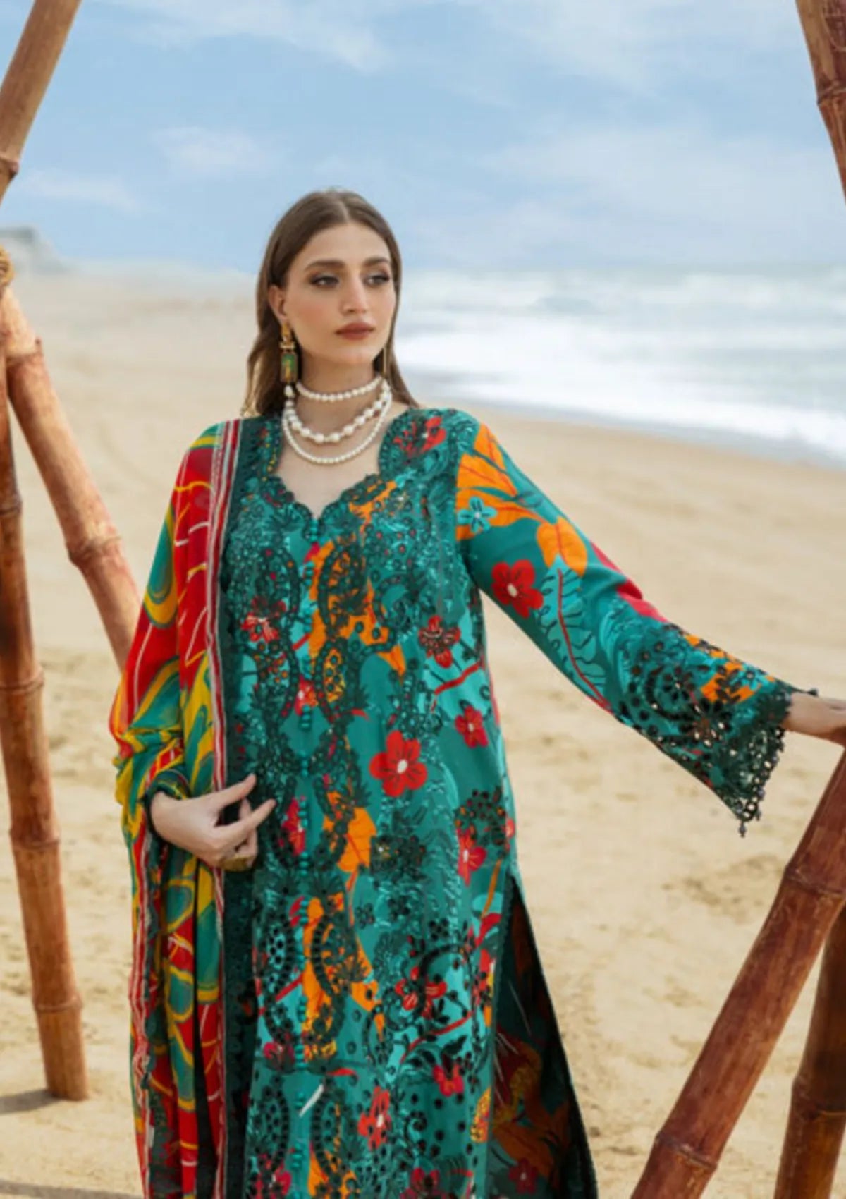 mohsin-saeed-fabrics-designer-daily-wear-formal-and-wedding-suits-within-budget-This-product-is-from-naqsh-ocean-opulence-viscose25-d-00170-teal-is-available-on-Mohsin-saeed-fabrics-website.