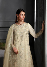 mohsin-saeed-fabrics-affordable-luxury-outfits-for-daily-formal-and-wedding-wear-This-product-is-from-qalamkar-elirah-formals-organza25-mf-04-ivory-grace-is-available-on-Mohsin-saeed-fabrics-website.