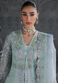 mohsin-saeed-fabrics-affordable-luxury-outfits-for-daily-formal-and-wedding-wear-This-product-is-from-qalamkar-elirah-formals-organza25-mf-08-serene-aqua-is-available-on-Mohsin-saeed-fabrics-website.