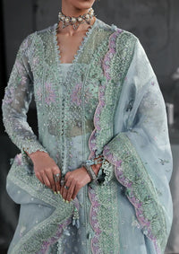 mohsin-saeed-fabrics-affordable-luxury-outfits-for-daily-formal-and-wedding-wear-This-product-is-from-qalamkar-elirah-formals-organza25-mf-08-serene-aqua-is-available-on-Mohsin-saeed-fabrics-website.
