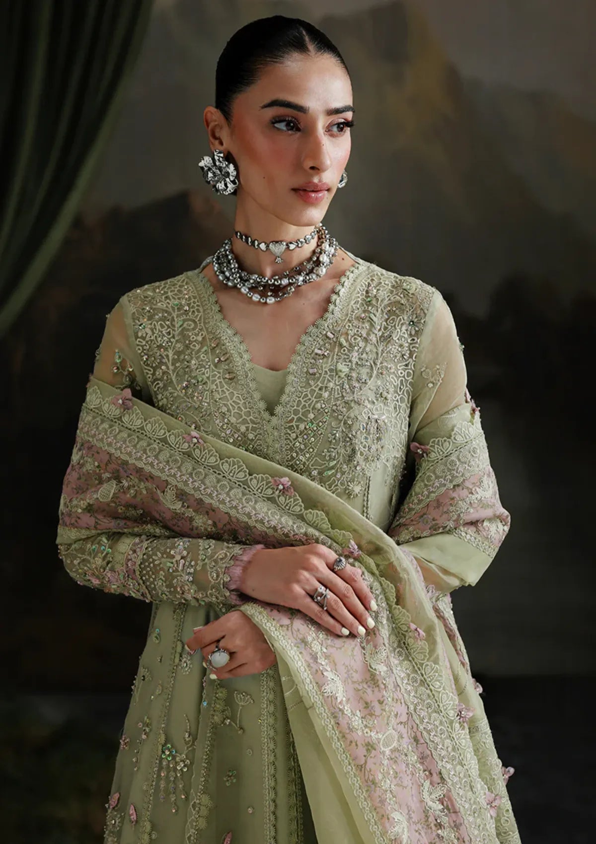 mohsin-saeed-fabrics-affordable-luxury-outfits-for-daily-formal-and-wedding-wear-This-product-is-from-qalamkar-elirah-formals-organza25-mf-02-sage-aura-is-available-on-Mohsin-saeed-fabrics-website.