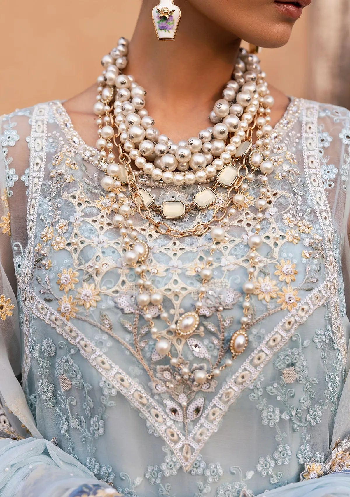 mohsin-saeed-fabrics-designer-daily-wear-formal-and-wedding-suits-within-budget-This-product-is-from-sardinia-chiffons-edit25-d-04-feroza-is-available-on-Mohsin-saeed-fabrics-website.