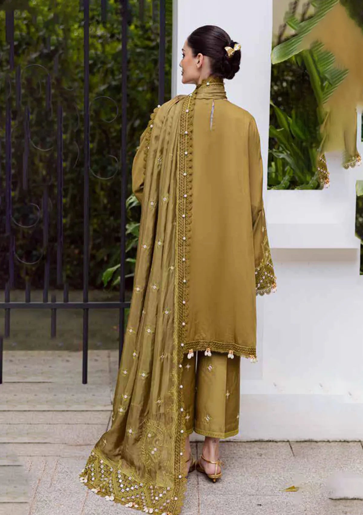 mohsin-saeed-fabrics-affordable-luxury-outfits-for-daily-formal-and-wedding-wear-This-product-is-from-marjjan-lovella-emb-viscose25-mev-43a-olive-is-available-on-Mohsin-saeed-fabrics-website.