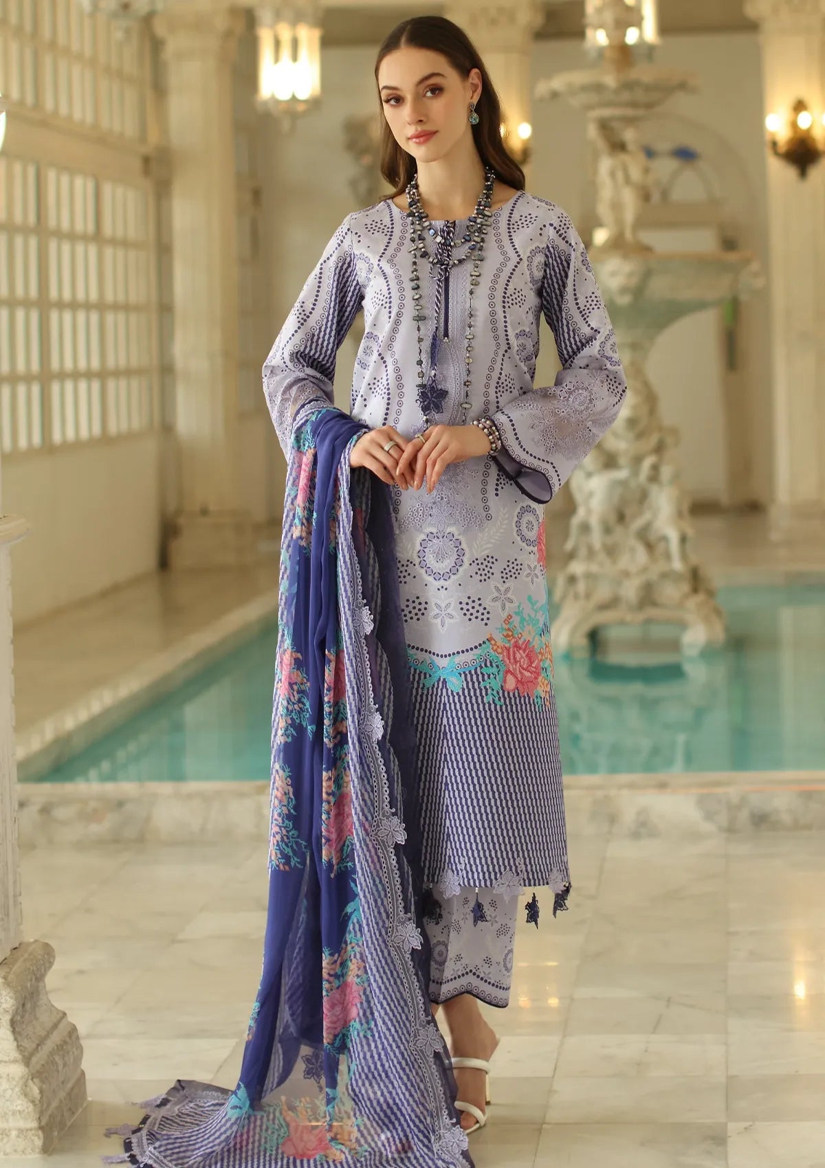 mohsin-saeed-fabrics-affordable-luxury-outfits-for-daily-formal-and-wedding-wear-This-product-is-from-charizma-aniiq-emb-lawn25-an5-01-is-available-on-Mohsin-saeed-fabrics-website.