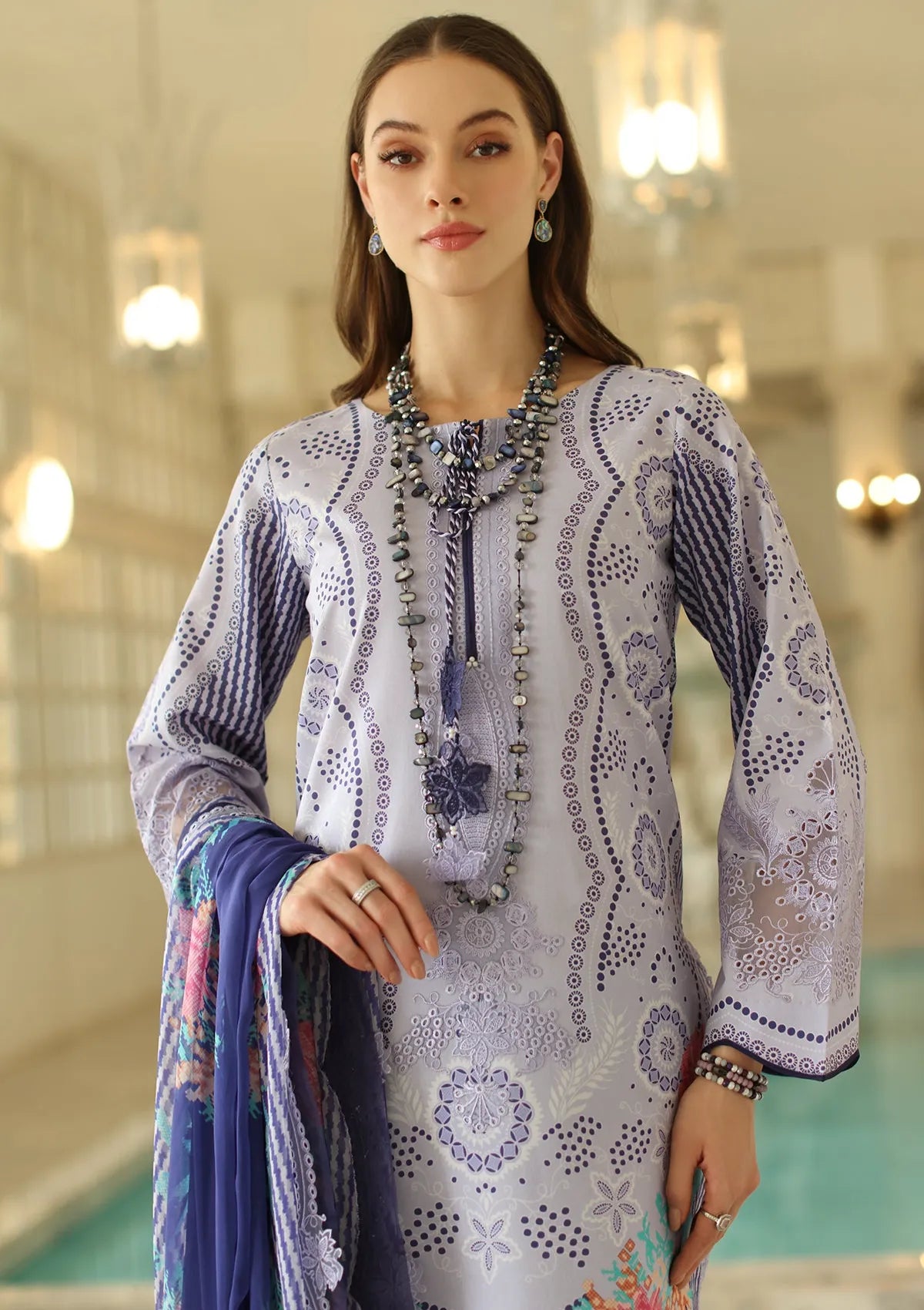 mohsin-saeed-fabrics-affordable-luxury-outfits-for-daily-formal-and-wedding-wear-This-product-is-from-charizma-aniiq-emb-lawn25-an5-01-is-available-on-Mohsin-saeed-fabrics-website.