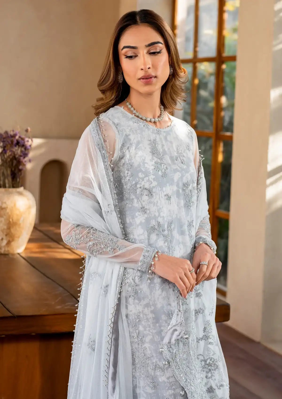 mohsin-saeed-fabrics-designer-daily-wear-formal-and-wedding-suits-within-budget-This-product-is-from-zarif-iris-printed-emb-edit25-d-02-stella-is-available-on-Mohsin-saeed-fabrics-website.