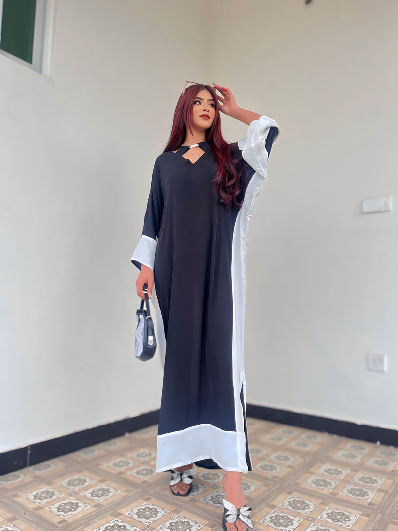 Pop of Black kaftan Manahils