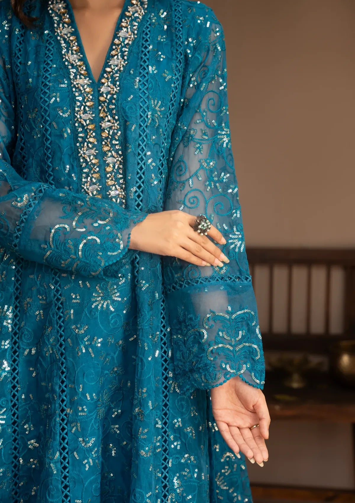 mohsin-saeed-fabrics-luxury-fashion-collection-daily-wear-wedding-and-formal-in-budget-This-product-is-from-manahils-k-151-teal-is-available-on-Mohsin-saeed-fabrics-website.