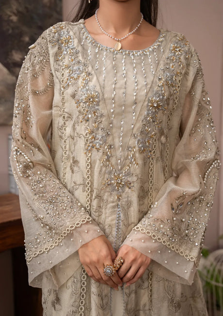 mohsin-saeed-fabrics-designer-daily-wear-formal-and-wedding-suits-within-budget-This-product-is-from-manahils-k-160-camel-brown-is-available-on-Mohsin-saeed-fabrics-website.