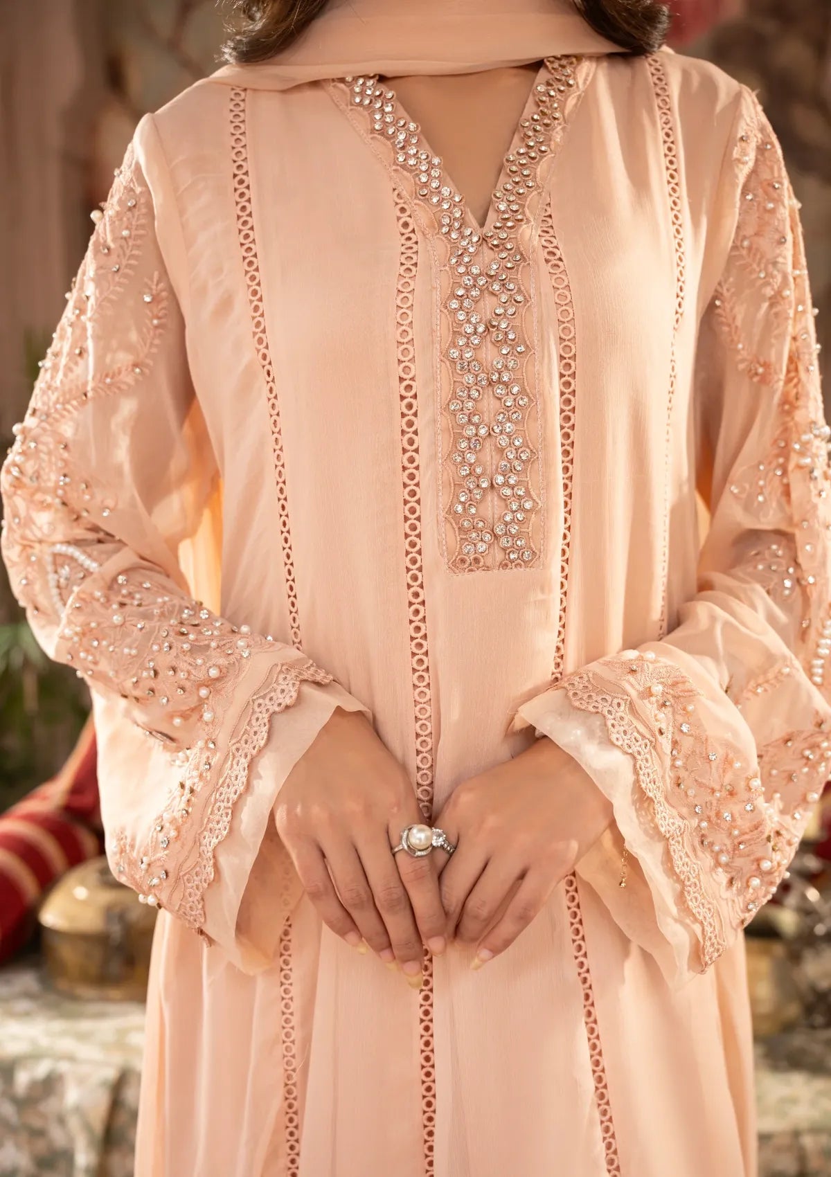 mohsin-saeed-fabrics-designer-daily-wear-formal-and-wedding-suits-within-budget-This-product-is-from-manahils-k-165-peach-is-available-on-Mohsin-saeed-fabrics-website.