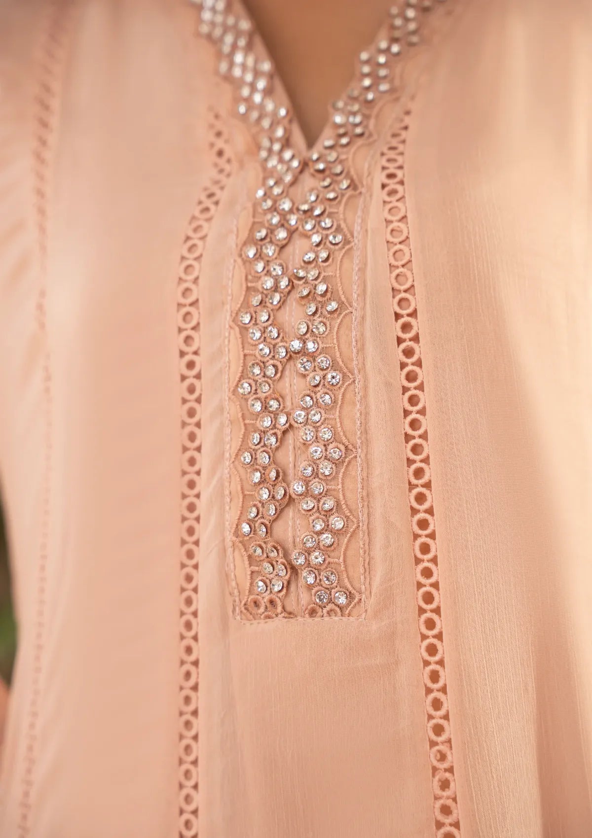 mohsin-saeed-fabrics-designer-daily-wear-formal-and-wedding-suits-within-budget-This-product-is-from-manahils-k-165-peach-is-available-on-Mohsin-saeed-fabrics-website.