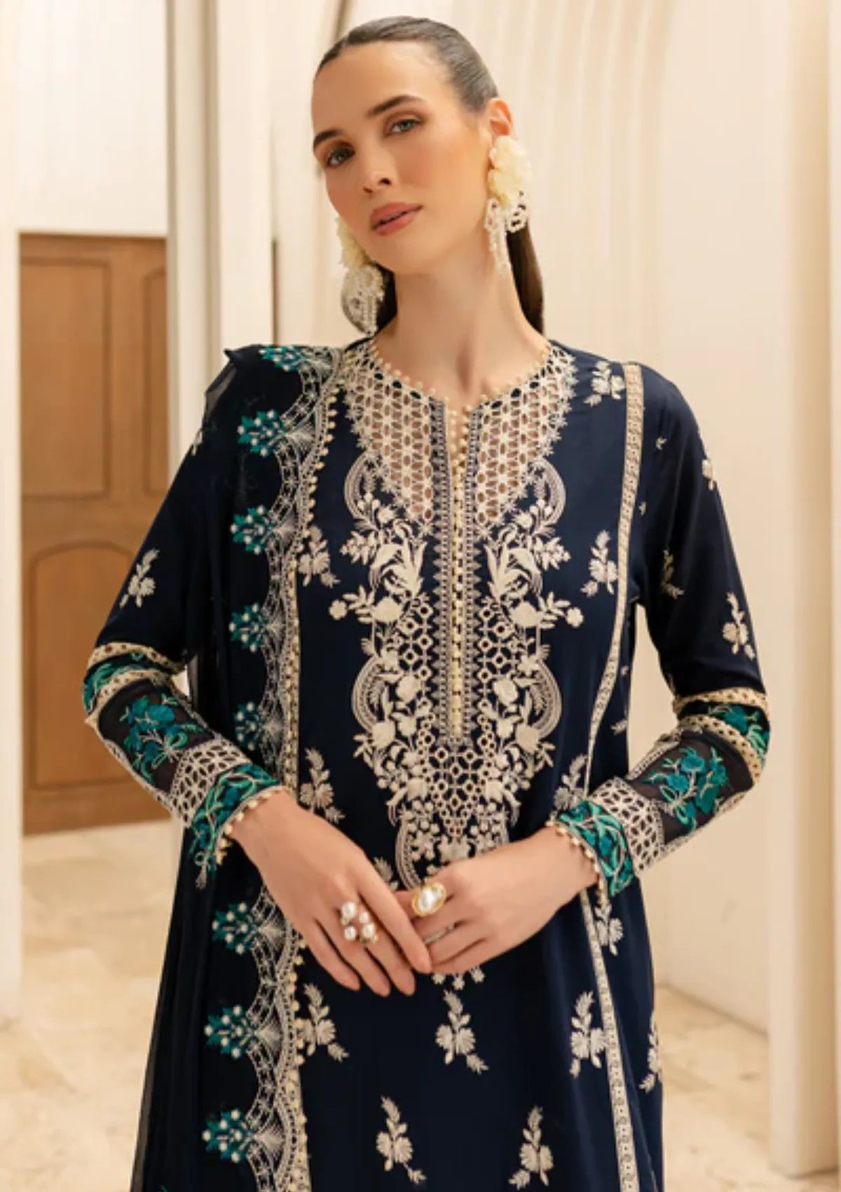 mohsin-saeed-fabrics-designer-daily-wear-formal-and-wedding-suits-within-budget-This-product-is-from-marjjan-ruhi-luxury-lawn25-mll-04-a-navy-blue-is-available-on-Mohsin-saeed-fabrics-website.