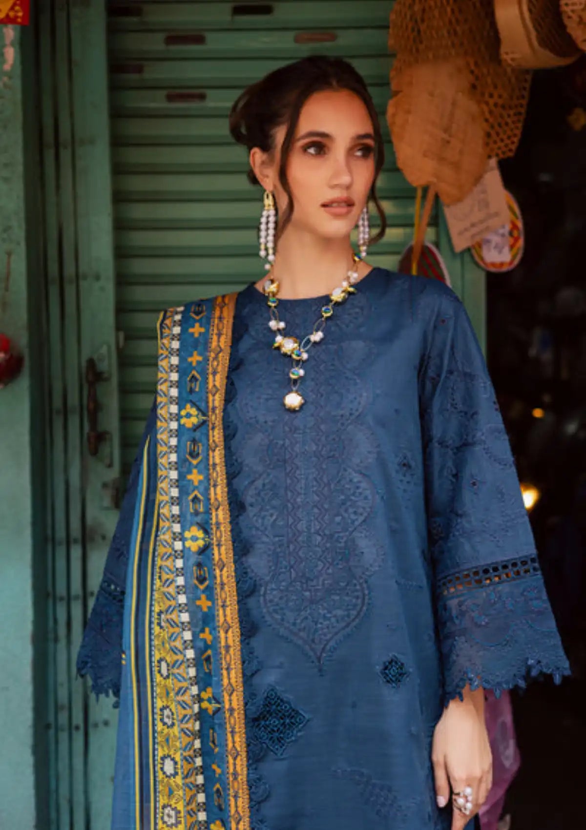 mohsin-saeed-fabrics-affordable-luxury-outfits-for-daily-formal-and-wedding-wear-This-product-is-from-marjjan-carnation-emb-lawn25-is-available-on-Mohsin-saeed-fabrics-website.