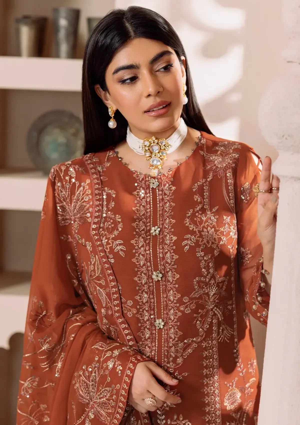 mohsin-saeed-fabrics-affordable-luxury-outfits-for-daily-formal-and-wedding-wear-This-product-is-from-dua-by-alizeh25-d-02a-lyra-rust-is-available-on-Mohsin-saeed-fabrics-website.