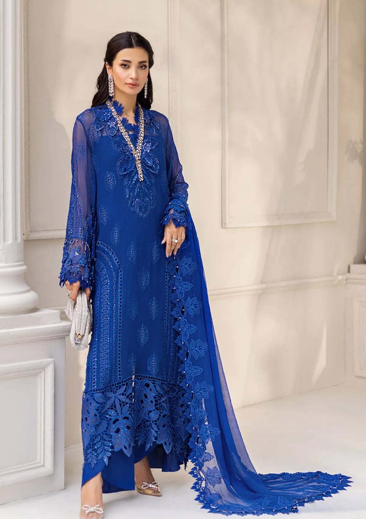 mohsin-saeed-fabrics-designer-daily-wear-formal-and-wedding-suits-within-budget-This-product-is-from-maria-b-unstitched-chiffons25-d-03-is-available-on-Mohsin-saeed-fabrics-website.