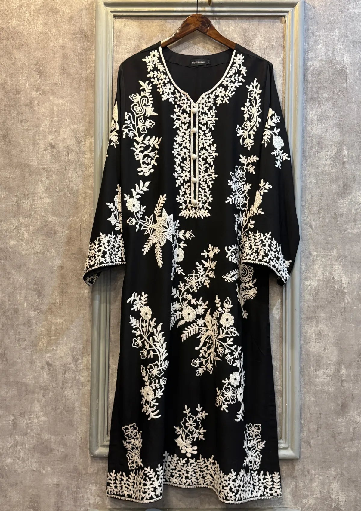 mohsin-saeed-fabrics-designer-daily-wear-formal-and-wedding-suits-within-budget-This-product-is-from-manahils-black-flower-embroidered-two-pc-is-available-on-Mohsin-saeed-fabrics-website.