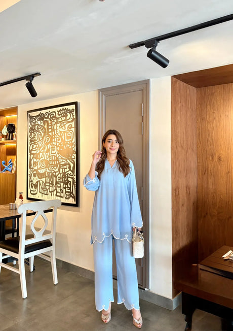 mohsin-saeed-fabrics-designer-daily-wear-formal-and-wedding-suits-within-budget-This-product-is-from-manahils-ice-blue-hem-co-ord-set-is-available-on-Mohsin-saeed-fabrics-website.