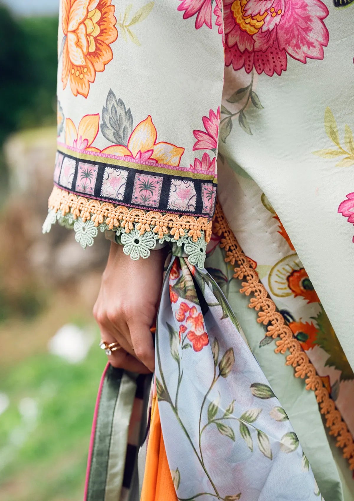 mohsin-saeed-fabrics-affordable-luxury-outfits-for-daily-formal-and-wedding-wear-This-product-is-from-roheenaz-garden-veil-printed-lawn25-d-05a-crimson-whisper-is-available-on-Mohsin-saeed-fabrics-website.