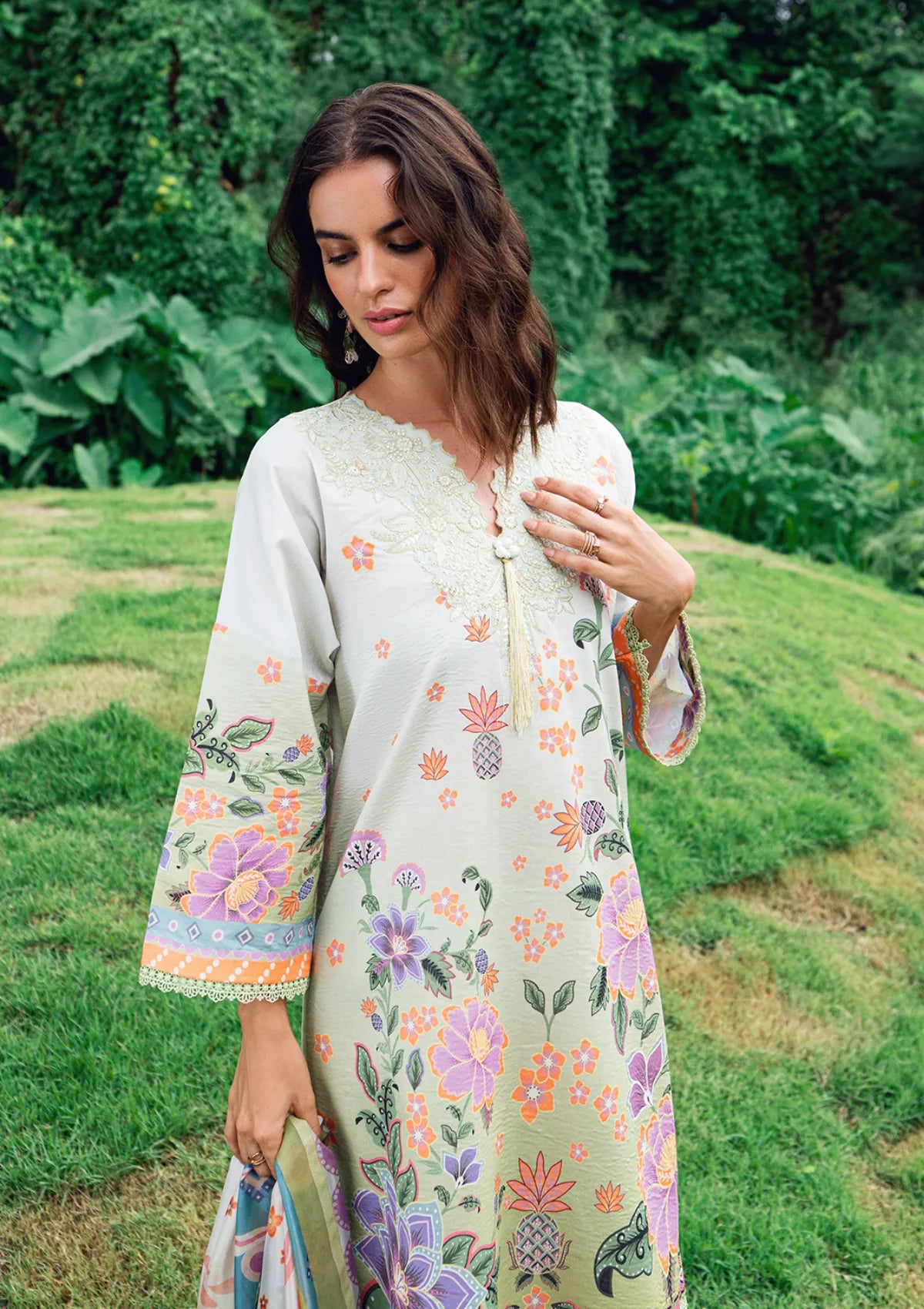 mohsin-saeed-fabrics-affordable-luxury-outfits-for-daily-formal-and-wedding-wear-This-product-is-from-roheenaz-garden-veil-printed-lawn25-d-04b-melon-muse-is-available-on-Mohsin-saeed-fabrics-website.