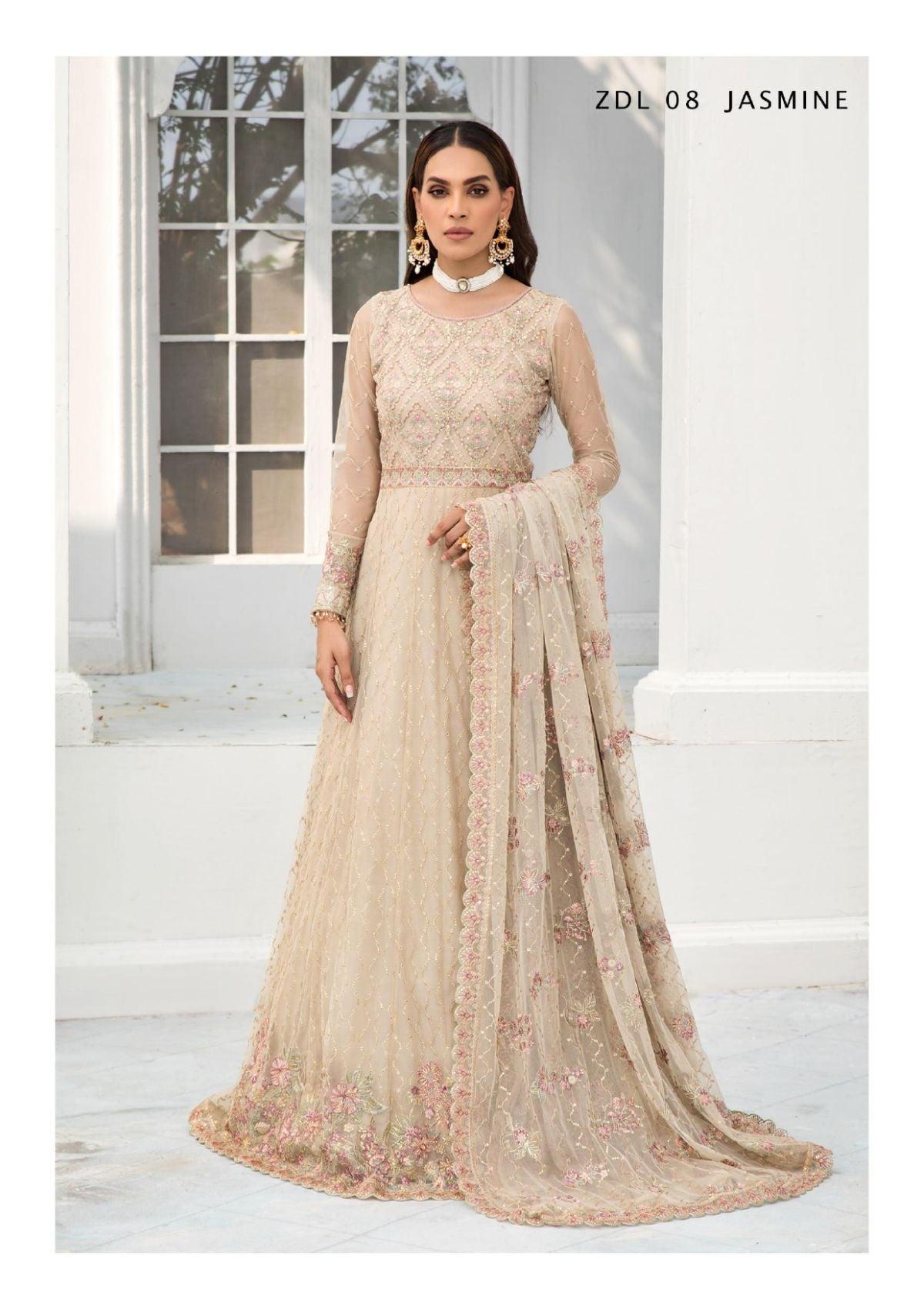 Embroidered Ada work and heavily Embellished Wedding & formal dresses available at mohsin saeed Fabrics online store. 