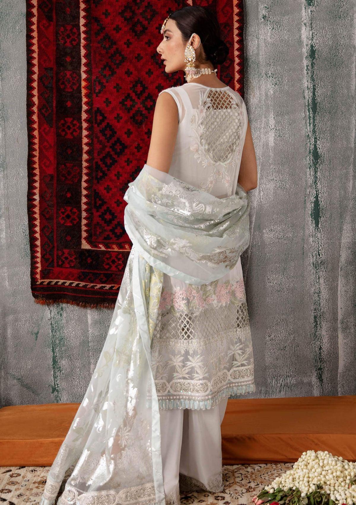 Embroidered Ada work and heavily Embellished Wedding & formal dresses available at mohsin saeed Fabrics online store. 